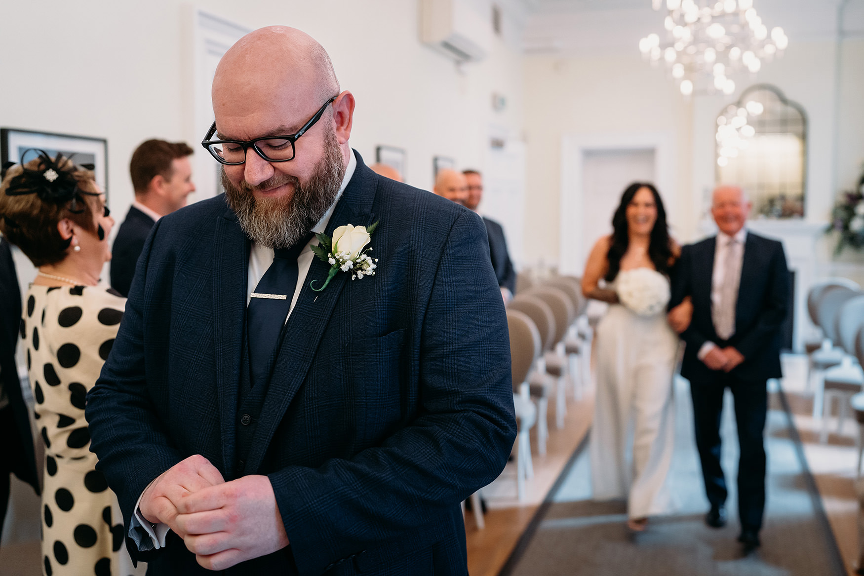 Groom waits for bride at 23 Montrose Street Glasgow micro wedding