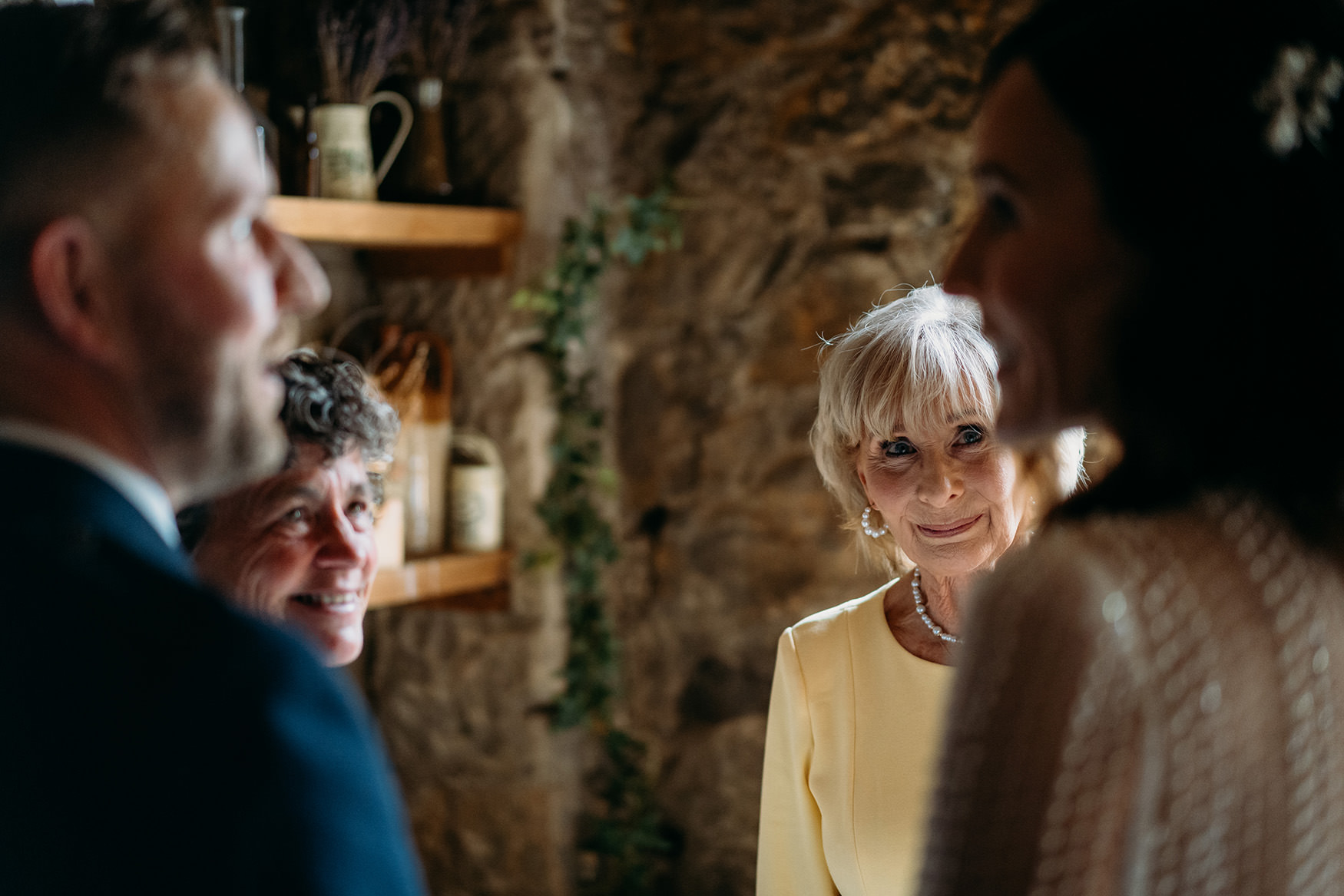 Mum looks at daughter during Glasgow micro wedding at The Bothy