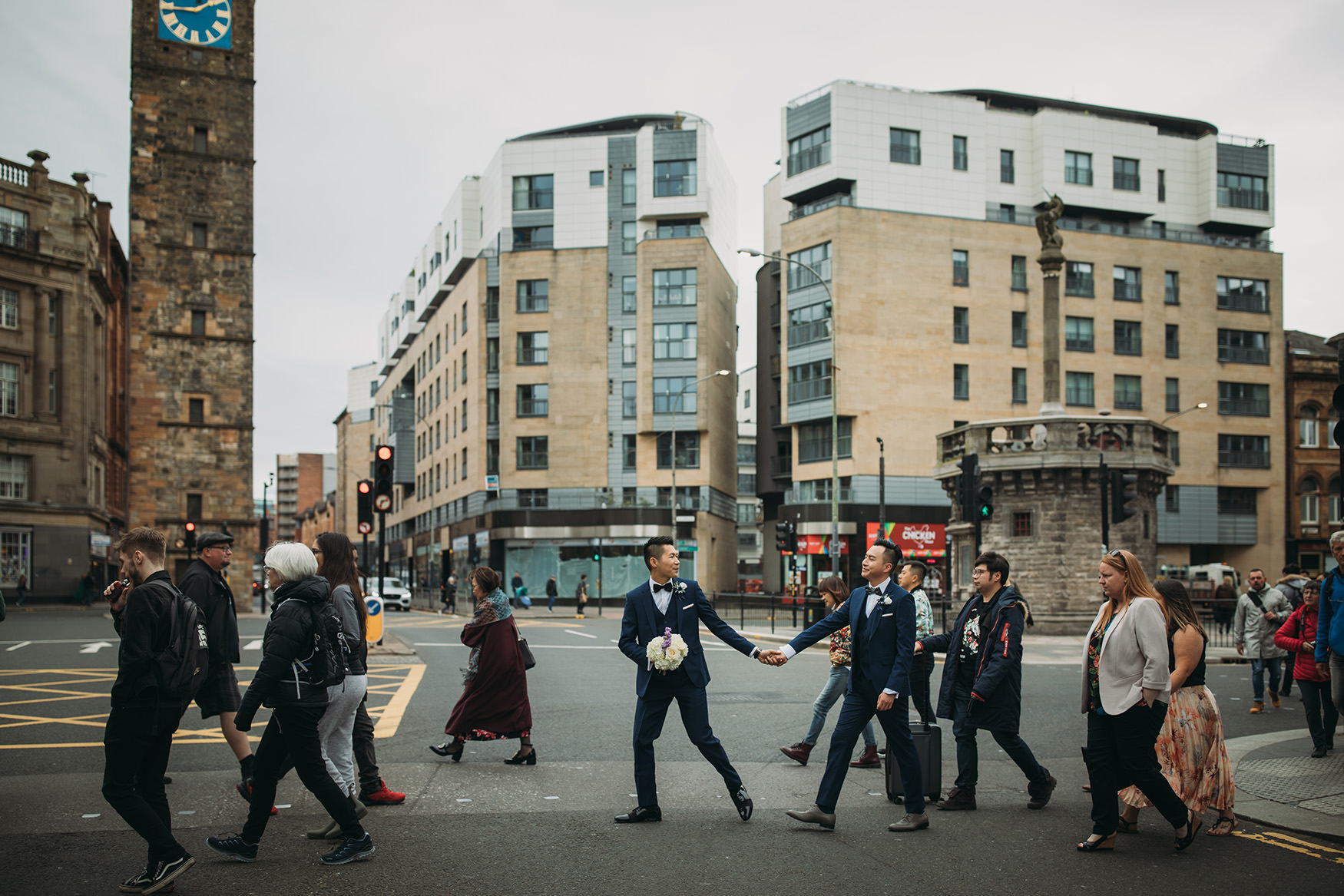 Two men walk to their Glasgow micro wedding