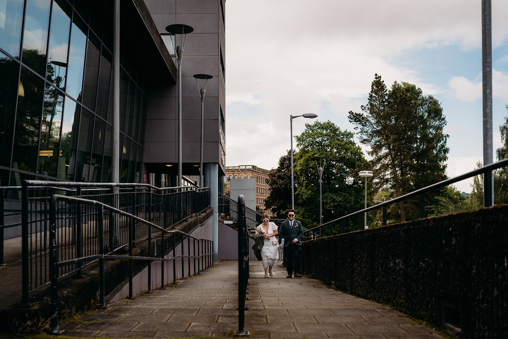 bride and groom arriving at their paisley registry office wedding, Renfrewshire House