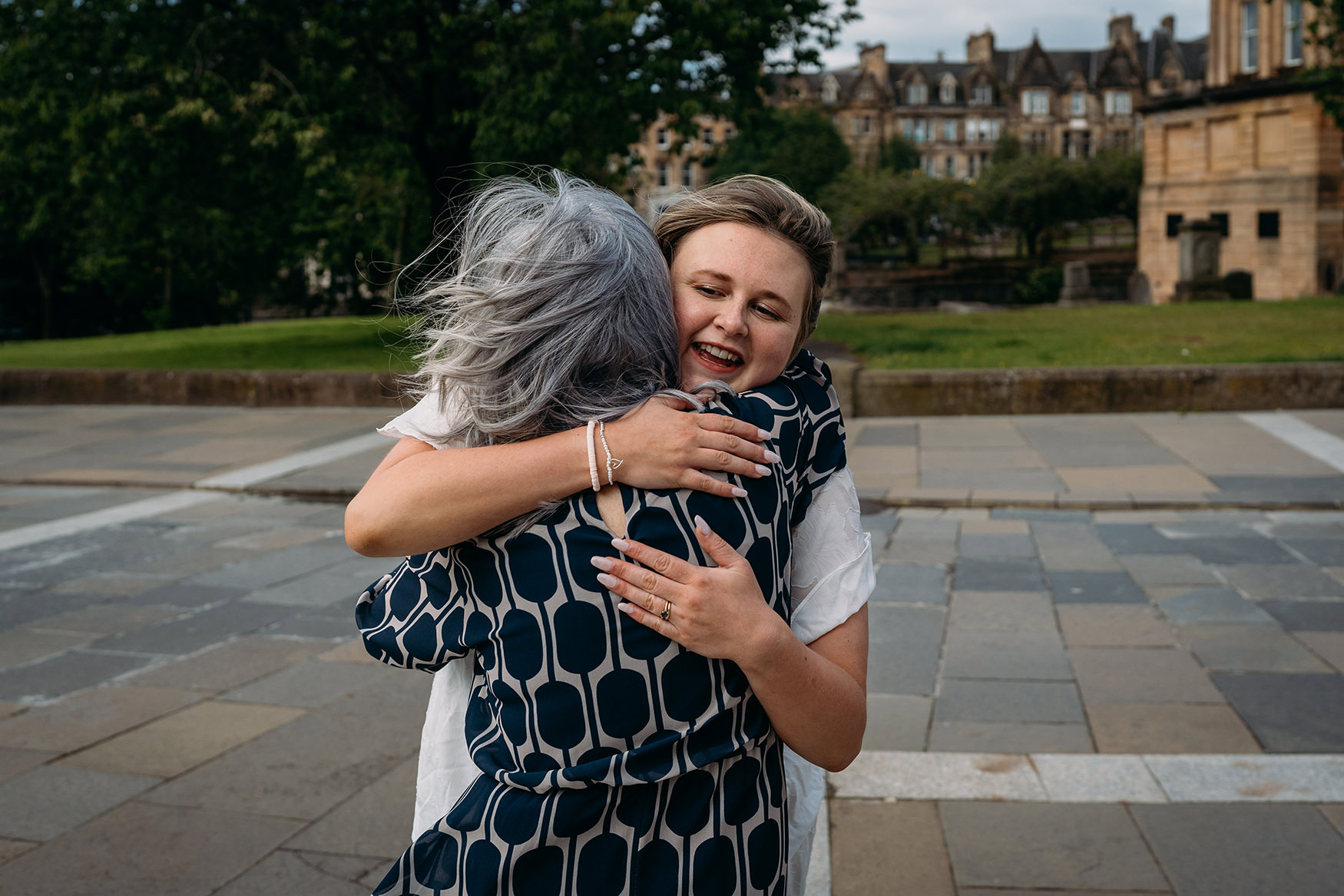 bride hugs mother in law at Paisley registry office wedding