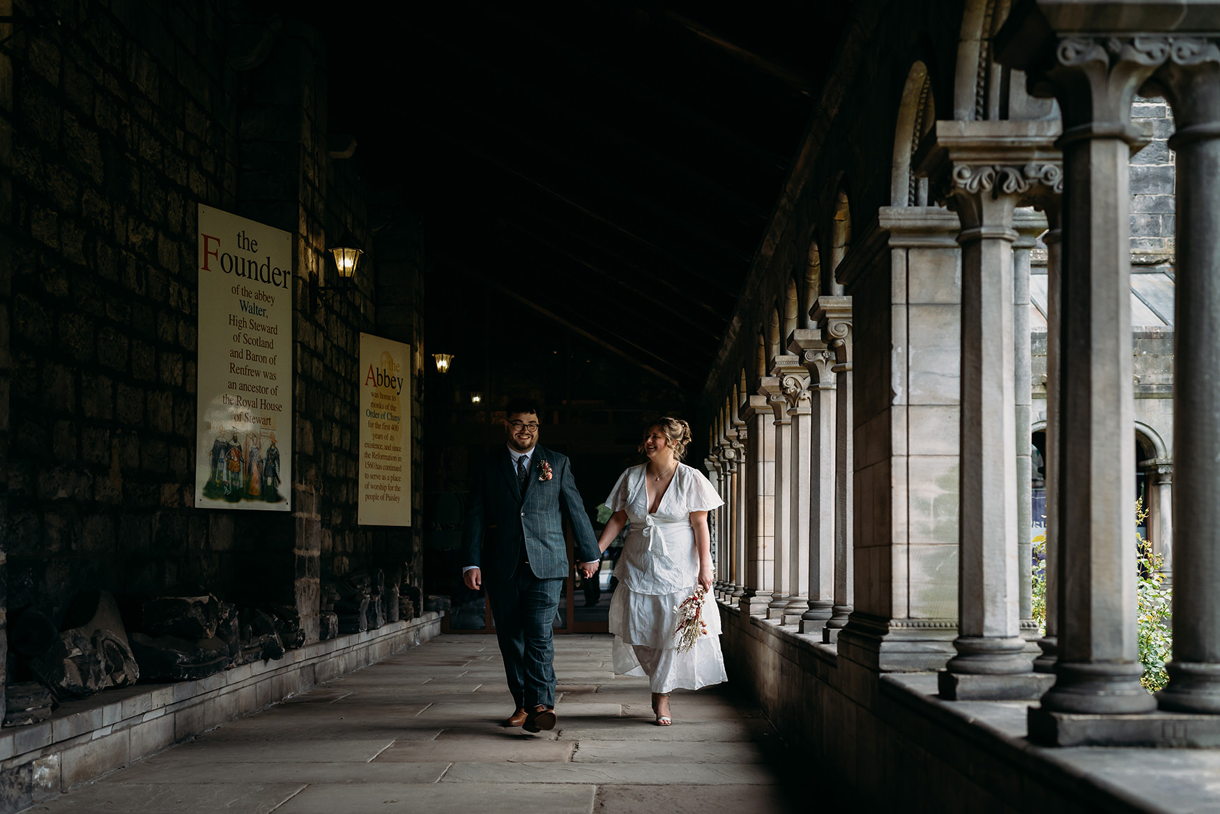 Newlyweds walk through Paisley Abbey after their Paisley registry office wedding