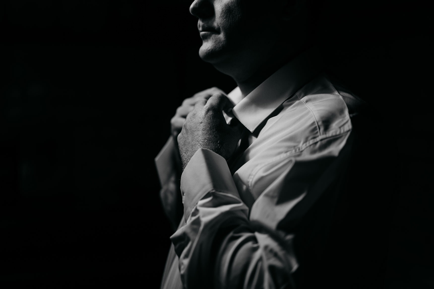 Groom service at House Martin Barbers, man does his tie ahead of Platform Glasgow wedding