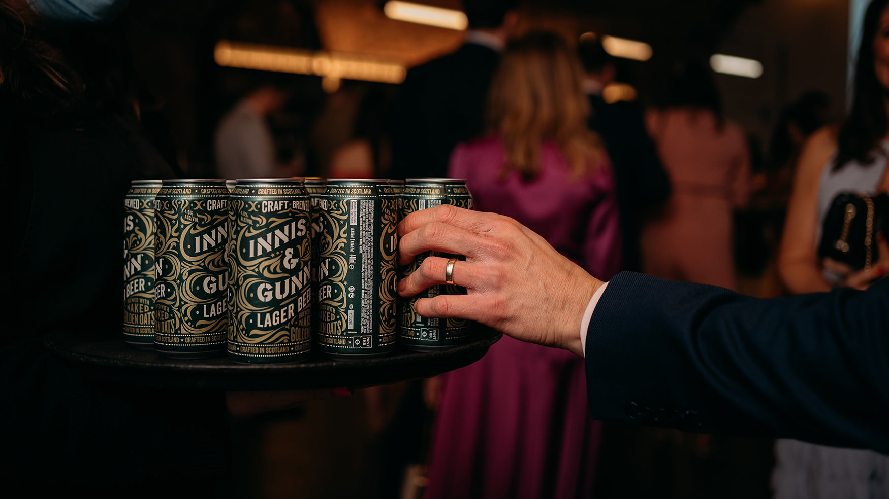 man reaches for beer can at Platform Glasgow wedding