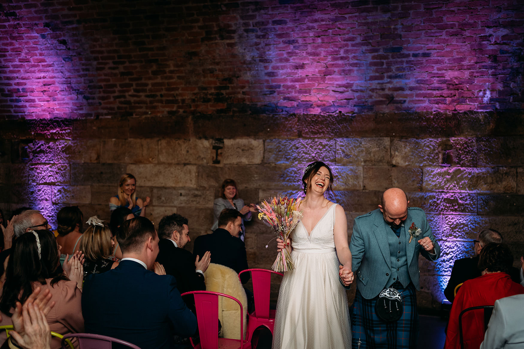 happy newlyweds leaving Platform Glasgow wedding ceremony