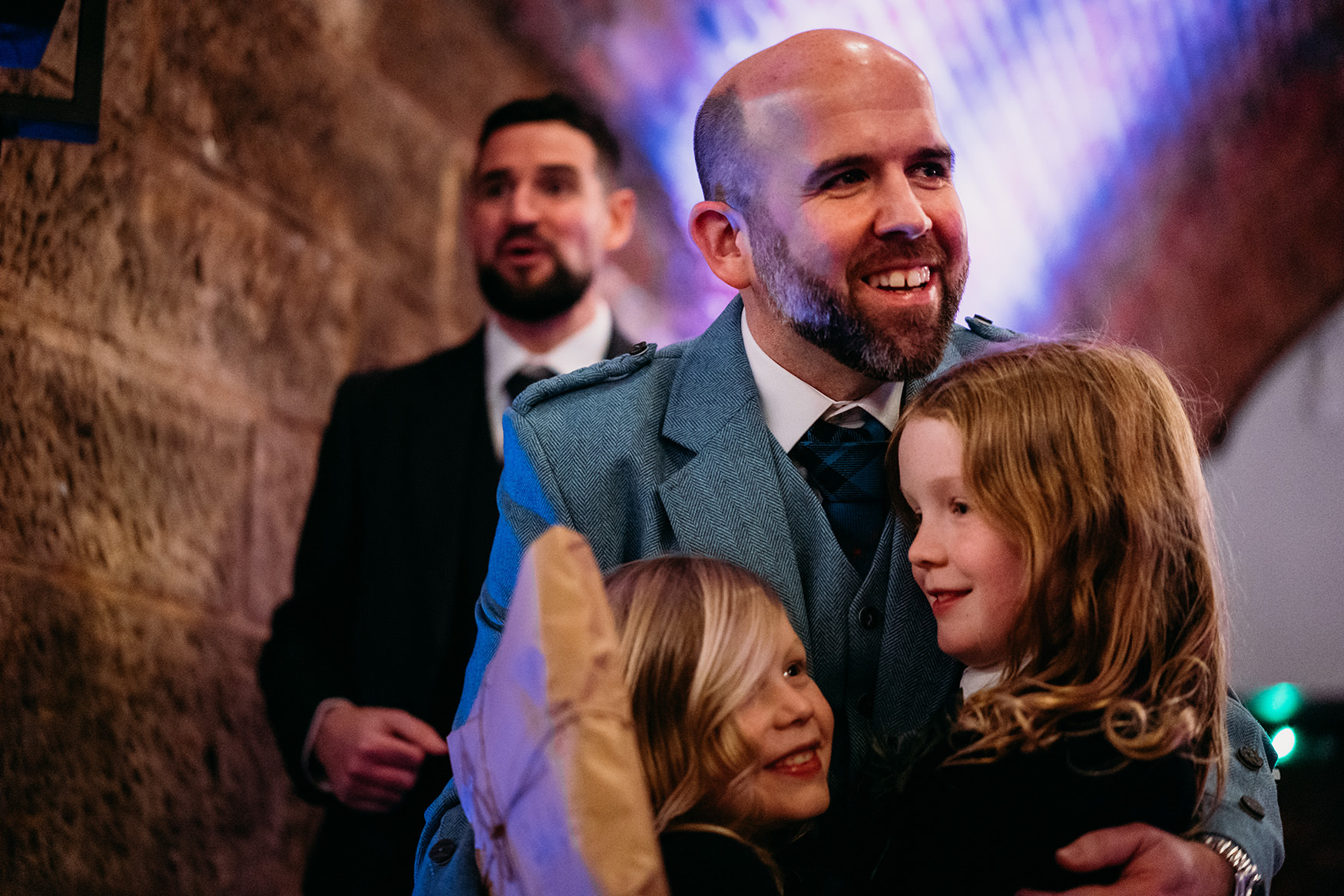 Groom hugs nephews ahead of his Platform Glasgow wedding