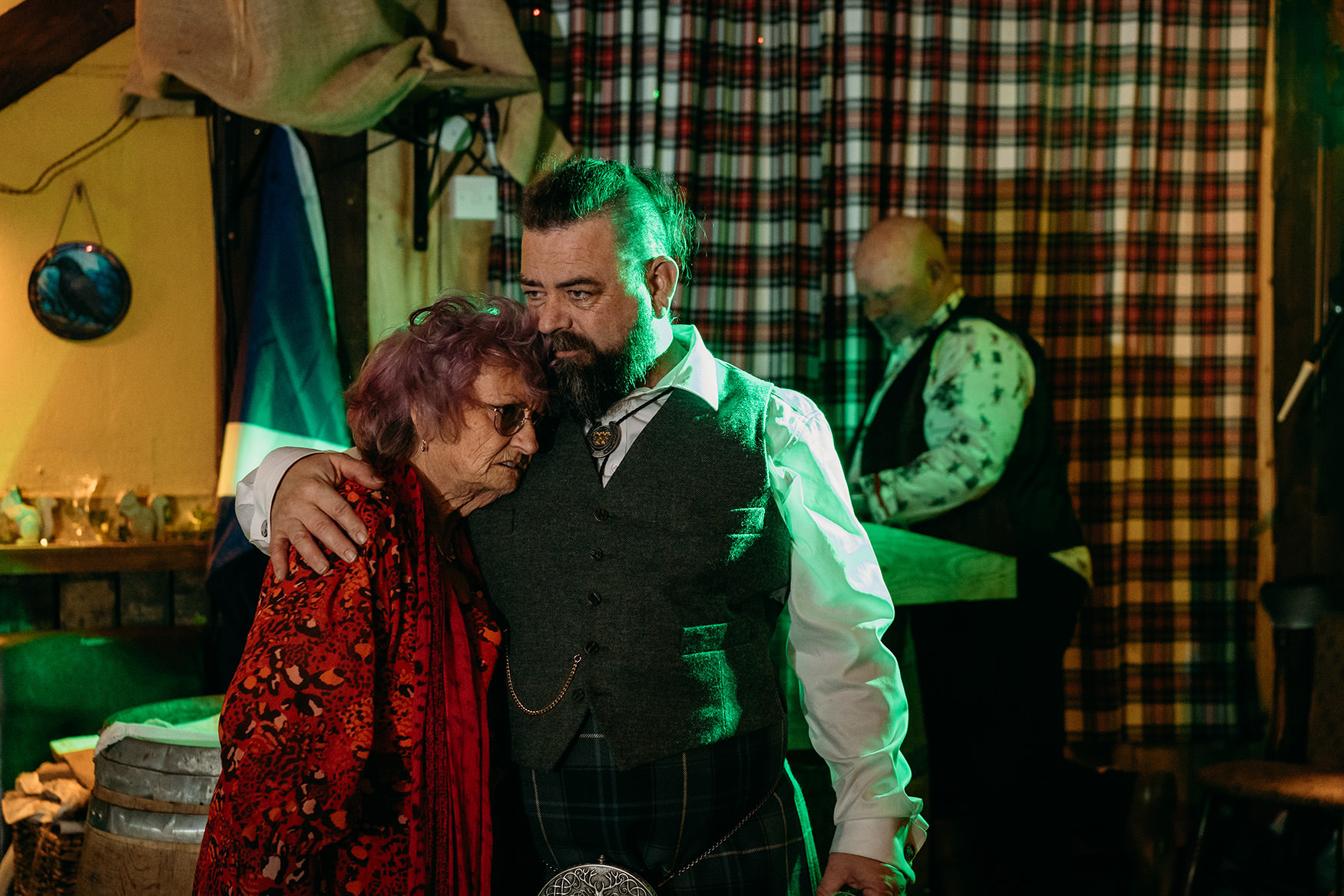 Groom hugs Mum at his wedding at The Gathering at Woodhead Farm