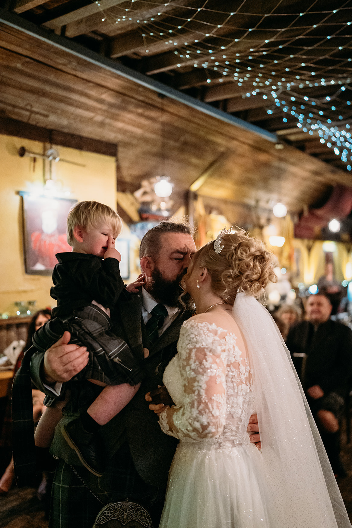 First kiss at The Gathering at Woodhead Farm wedding